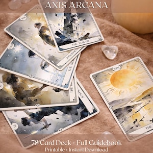 May include: A deck of tarot cards with watercolor illustrations, including cards labeled "The Tower," "Judgement," and "The Sun." The cards are arranged on a brown surface, with the text "Axis Arcana" and "78 Card Deck + Full Guidebook" visible.