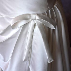 short wedding dress, reception dress, courthouse wed dress, vintage wedding dress, two piece corset dress, affordable wedding dress, after party dress, mini wedding dress, engagement party dress, removable train, plus size dress, waist snatch, bridal, mini wedding dress, bubble skirt wedding dress, rehearsal dinner dress, vestido de novia, elopement dress, bridal mini, custom wedding dress, high quality dress, basque waist, long train dress, civil wedding, pointy front corset, steven khalil