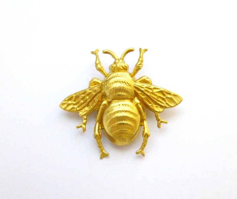 Gold bee brooch deals