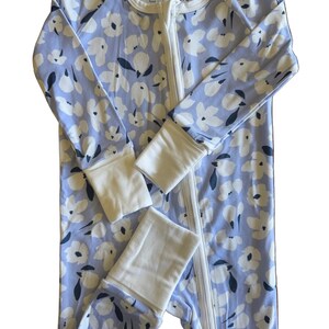 bamboo sleeper for little girls in off purple. white floral print with blue accent. perfect for your little girl.