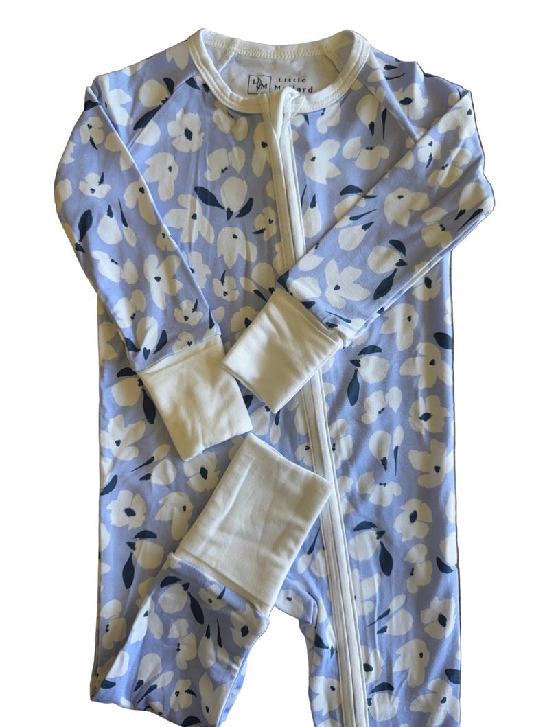 bamboo sleeper for little girls in off purple. white floral print with blue accent. perfect for your little girl.