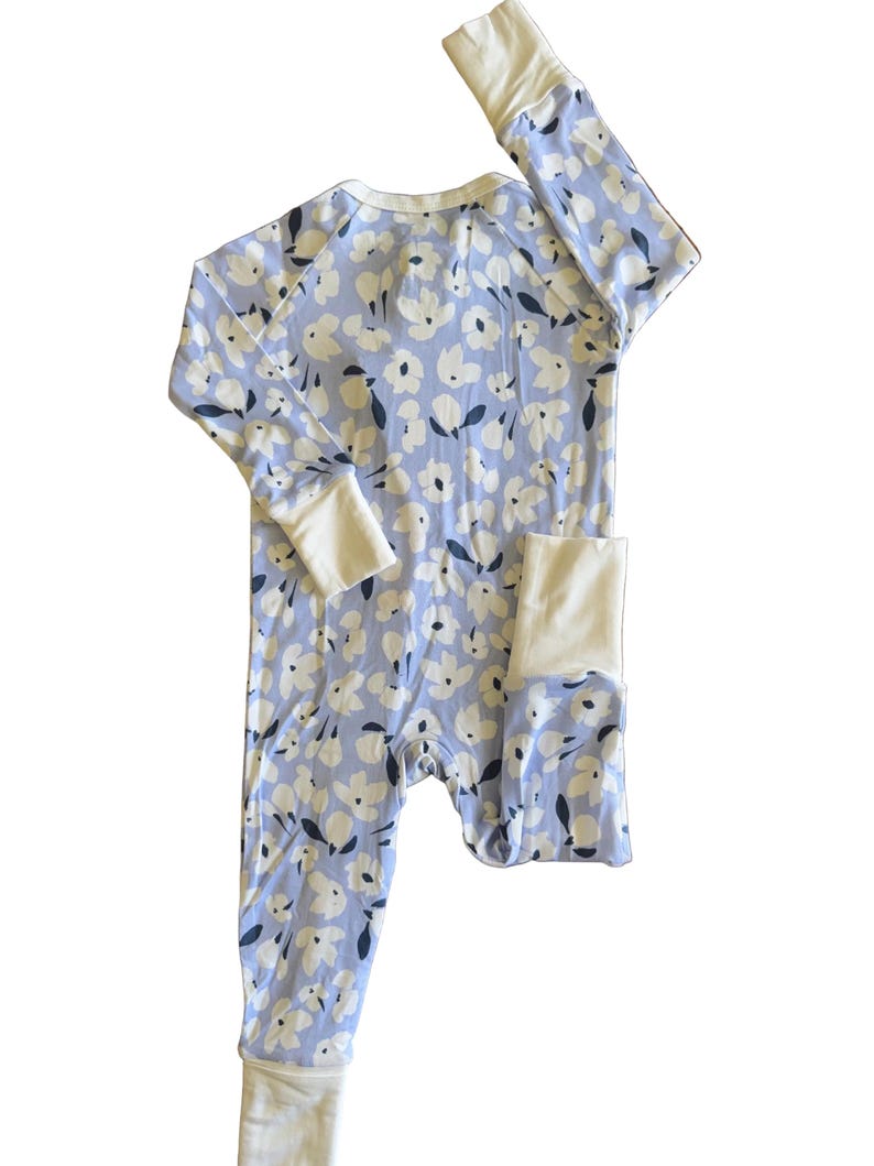 blue bamboo baby pajama with white flowers. Pajama is a convertible design. this pajama is perfect for spring, summer, Easter, baby shower gift, birthday gift