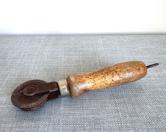 Vintage leatherworking roller, leather creaser, stitcher, or tracing wheel, with distressed wooden handle, USA Made