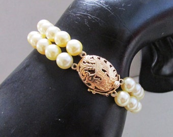 Vintage Estate Mings of Honolulu  14K Gold Phoenix Design Clasp Two Strand High Luster Golden Toned Pearl Bracelet