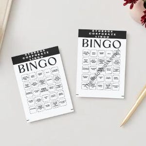May include: Two black and white bingo cards with the title "Storage Corporate Lingo Bingo". Each card has a 5x5 grid with various phrases related to storage and corporate jargon.