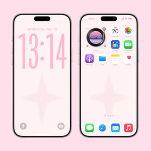 May include: Two smartphones with pink screens and black borders are displayed. The left screen shows the time 13:14 and the date. The right screen displays app icons, including Calendar, Photos, FaceTime, and others. The background is a soft pink.