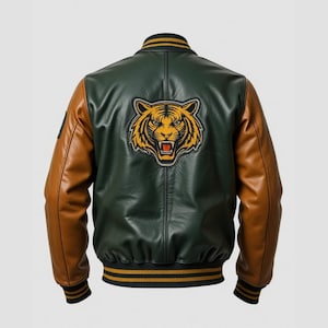 May include: A green and brown varsity jacket with a tiger patch on the back. The jacket has brown sleeves, a green body, and black, gold, and green striped cuffs and collar. The tiger patch is yellow and black.