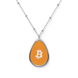 naszyjnik z symbolem bitcoina - biżuteria kryptomemów