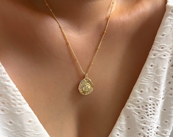 Collana con ciondolo a forma di uccello, sole e satellite (placcata oro 14 carati)