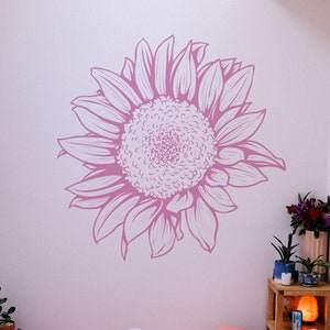 May include: A pink and white sunflower graphic wall decal. The sunflower is drawn in a detailed, realistic style.