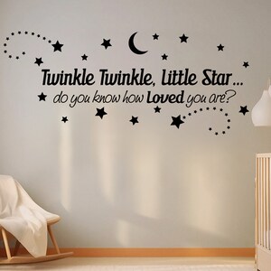 May include: Black and white wall decal with the text "Twinkle Twinkle, Little Star... do you know how Loved you are?" and a crescent moon and stars.