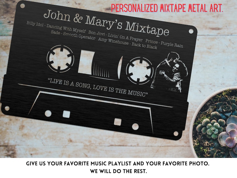 May include: A black metal cassette tape design with a couple's photo in the window. The text "John & Mary's Mixtape" is at the top of the design. The text "Life is a song, love is the music" is below the window.