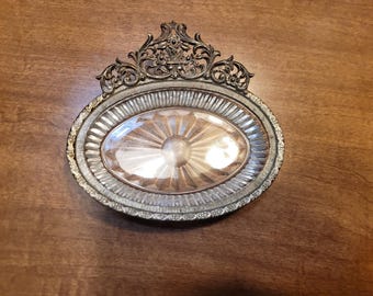 Vintage Matson filigree soap dish featuring a clear glass insert with a starburst pattern and ornate metalwork