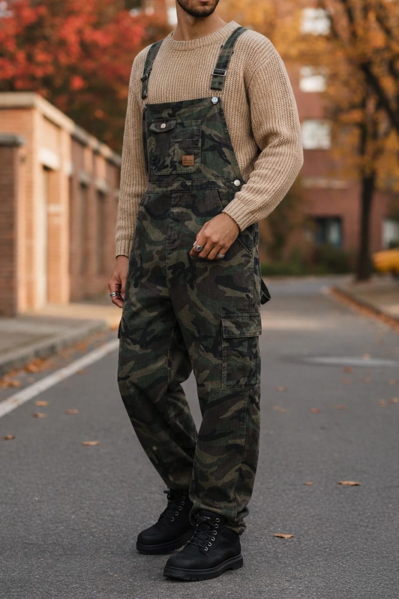 Men's slim-fit camouflage denim bib overalls with adjustable shoulder straps and multiple pockets in an urban streetwear design