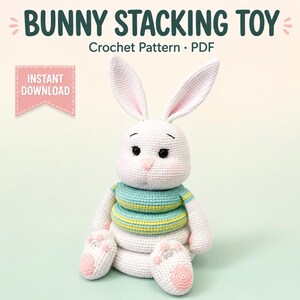 May include: A crochet bunny stacking toy pattern PDF featuring a white rabbit with long ears, black eyes, and pink cheeks. The bunny has a body made of stacked rings in teal and yellow stripes. Text reads BUNNY STACKING TOY, Crochet Pattern, PDF, INSTANT DOWNLOAD.