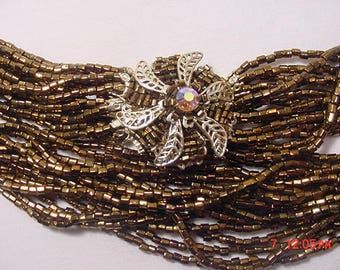 Vintage Japan Gold Bead Fifteen Strand Necklace With Aurora Borealis Accented Rhinestone Clasp  18 - 262