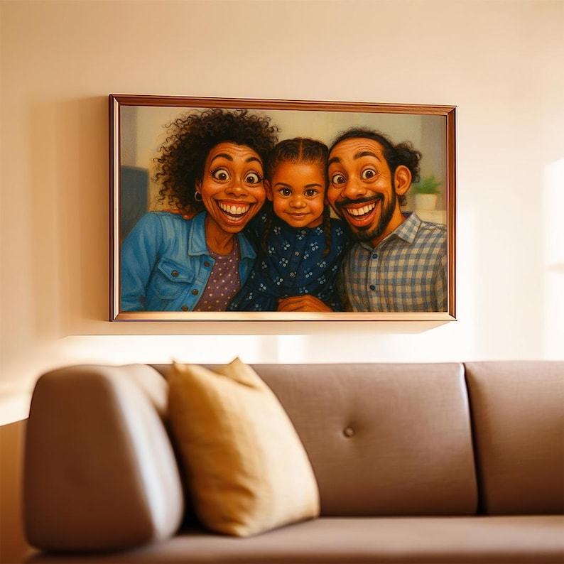 May include: A framed cartoon portrait of a family of three with exaggerated expressions. The artwork features a woman in a denim jacket, a young girl in a blue patterned top, and a man in a plaid shirt. The portrait hangs on a cream wall above a brown sofa.