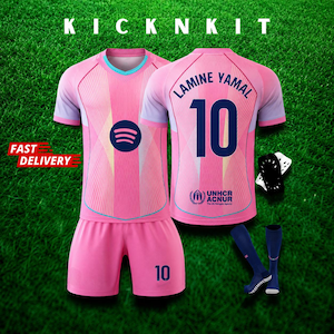 May include: Pink soccer kit with a light blue collar and sleeves. The jersey features the Spotify logo and the number 10. The shorts also have the number 10. The text "KICKNKIT" is at the top. Includes blue socks and black wristbands.