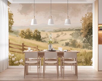 Puede incluir: Un comedor con un mural que representa un paisaje rural. Una mesa de comedor de madera con seis sillas se encuentra frente al mural. Lámparas colgantes blancas cuelgan sobre la mesa, creando un ambiente cálido y acogedor. La habitación está decorada en tonos neutros.