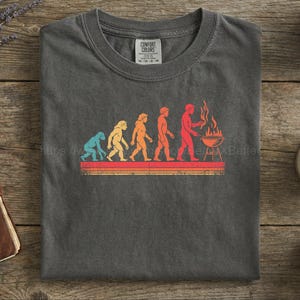 Comfort Colors T-Shirt Funny BBQ Evolution T-Shirt - Retro Grilling Shirt for Dad - Barbecue Pitmaster Gift - Vintage Grill - Father's Day