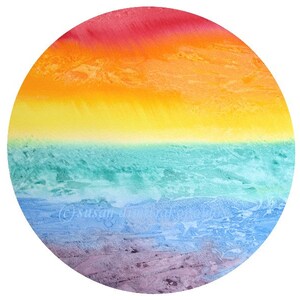 May include: A circular watercolor painting with a rainbow gradient. The colors are red, orange, yellow, green, blue, and purple. The painting has a textured look, like watercolors.
