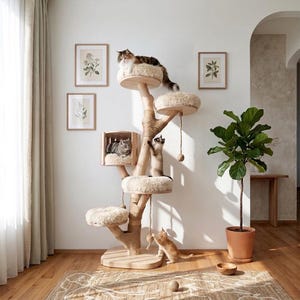 May include: A multi-level cat tree featuring a central wooden trunk design with several circular platforms topped with plush, cream-colored cushions. The structure includes a wooden cubby, sisal rope wrapping, and hanging toys for cats.