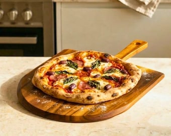 Pala de madera para pizza hecha a mano en Tailandia: tabla rústica para preparar y servir con asa