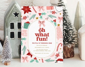 May include: A festive invitation card with a pink background and Christmas-themed illustrations, including candy canes, bows, and gifts. The text "Oh what fun!" is prominently displayed, announcing a first birthday celebration.