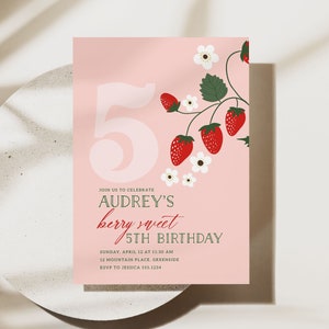 May include: Pink birthday invitation with a large white number 5 and a strawberry vine with red strawberries and white flowers. The text reads "Join us to celebrate Audrey's berry sweet 5th Birthday. Sunday, April 12 at 11:30 AM. 12 Mountain Place, Greenside. RSVP to Jessica 555.1234"