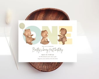 May include: A light blue, yellow, and white invitation card with a watercolor illustration of three brown bears. The bears are holding balloons and standing on the letters of the word "ONE". The text on the card reads "Join us to celebrate Bentley's beary first birthday, April 21 11:00 am, 24 Woodland Lane, East Lake, Regrets only Ashley 555.555.5555".