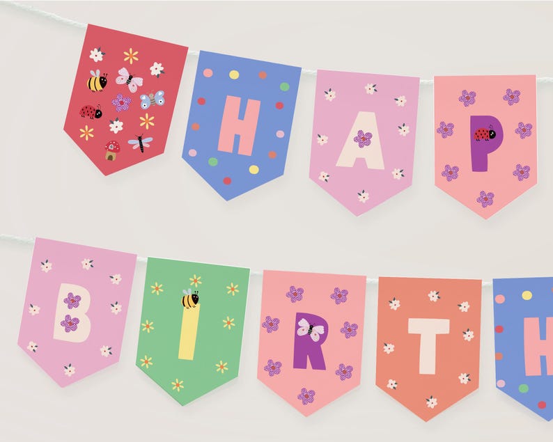 May include: A colorful banner spelling out "HAPPY BIRTHDAY" with individual pennants. Each pennant is a different color, featuring letters, flowers, and insects. The banner is strung on a white string, perfect for a birthday celebration.