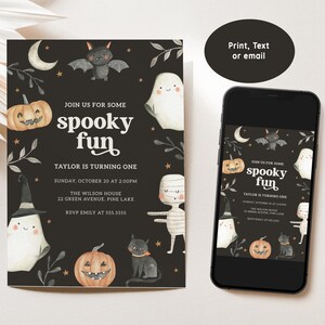 May include: A black and white Halloween party invitation with a spooky theme. The invitation features a ghost, a bat, a mummy, a pumpkin, and a cat. The text on the invitation reads "Join us for some spooky fun. Taylor is turning one. Sunday, October 20 at 2:00pm. The Wilson House, 22 Green Avenue, Pine Lake. RSVP Emily at 555-5555."
