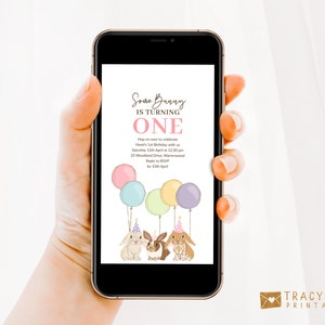 May include: A digital invitation for a first birthday party with a bunny theme. The invitation features a pink, blue, and yellow balloon bouquet, three bunnies wearing party hats, and the text "Some Bunny is Turning One".