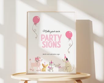 Peut inclure: Une affiche encadrée avec le texte "Make your own PARTY SIGNS" en rose. L'affiche présente des illustrations de chiens portant des chapeaux de fête et des ballons roses. L'affiche mesure 20 x 25 cm.