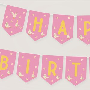May include: A pink banner with the words "HAPPY BIRTH" in yellow letters. Each pennant features a white goose illustration and small yellow stars. The banner is strung on a white string, perfect for a birthday celebration.