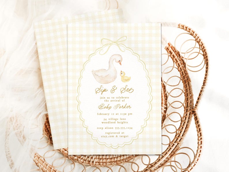 May include: A white and yellow baby shower invitation with a watercolor illustration of a swan and a duckling. The invitation reads "Sip & See" and includes the baby's name, date, time, and location. It also includes RSVP information and where the baby is registered.