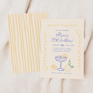 May include: A yellow and white striped card with a white card on top. The white card has a blue and yellow illustration of a cocktail glass with lemons and the text "Join us to celebrate Alison's 30th birthday! August 10th till late Jacob & Jen's Place 52 Mountain Highway Woodland Heights RSVP Jacob | 555.1834"