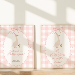 May include: Two framed prints with a pink gingham background and a white oval design. Each print features a cartoon goose wearing a party hat and the text "Create your own Party signs!" and "A Silly Goose is on the Loose!" The frames are 8 x 10 inches.