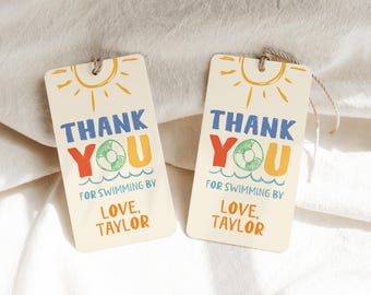 May include: Two colorful thank you tags with a sun, life preserver, and waves. The text reads "Thank You for swimming by Love, Taylor".