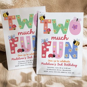 May include: Two birthday invitations with the words "Two Much Fun" in colorful letters. The invitations feature illustrations of bees, butterflies, ladybugs, and flowers. The text on the invitation reads "Join us to celebrate Madeline's 2nd Birthday".