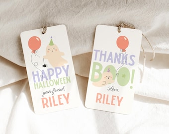 May include: Two rectangular gift tags with Halloween-themed illustrations. One says "Happy Halloween" with a ghost, balloon, and spider. The other says "Thanks Boo!" with a ghost and balloon. Both tags are personalized with the name "Riley".