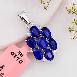 Elegant Blue Sapphire and Diamond Pendant – Cluster Design in 14k White Gold