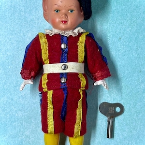 Antique Celluloid Key Wind Up German / Swiss Guard Doll, Souvenir, All Original, With Key, Works,  Highly Collectible