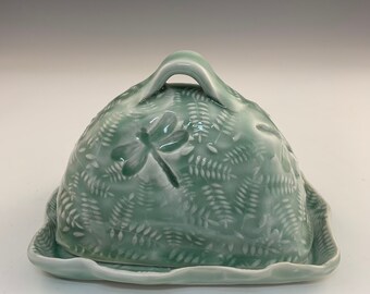 A  Porcelain Celadon Butter Dish With Impressed Vines and Dragonflies