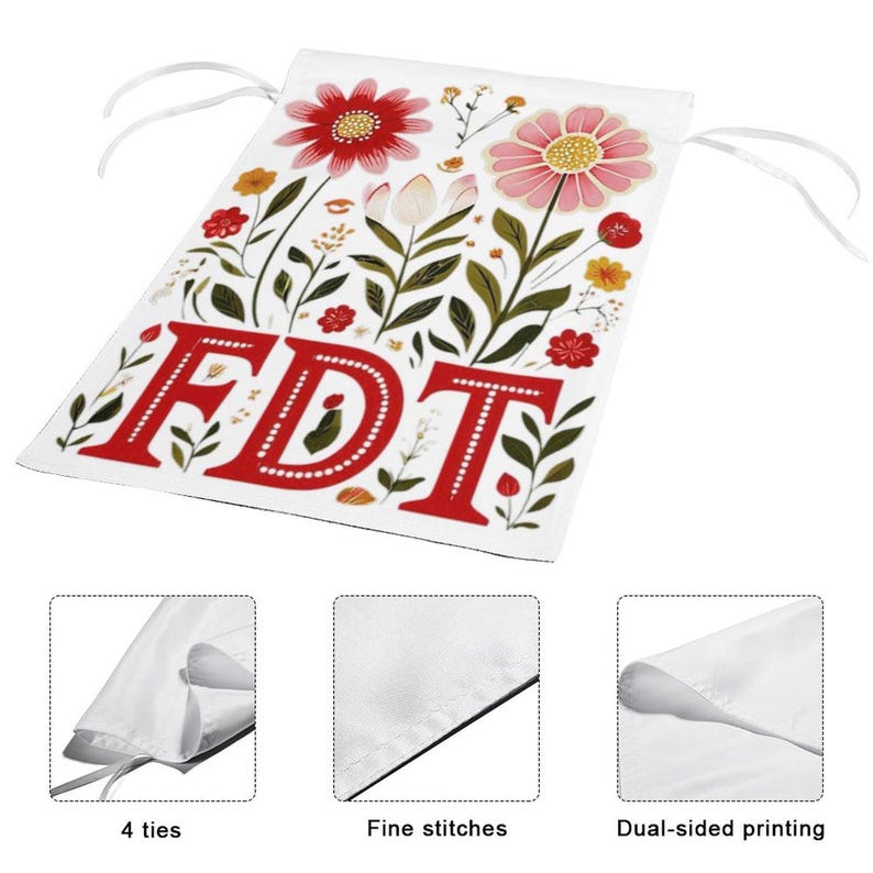 May include: White banner with red floral design and the letters "FDT" in red. The banner has four ties, fine stitches, and dual-sided printing. The floral design includes red and pink flowers, green leaves, and small yellow accents.
