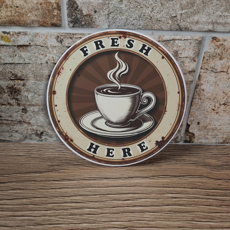 May include: A set of three ceramic mugs with a speckled, matte finish. The mugs are in shades of cream, light gray, and dark gray. Each mug has a simple, minimalist design, perfect for coffee or tea.