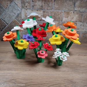 May include: A collection of colorful, artificial flowers in various hues, including orange, yellow, red, white, and purple. The flowers have green stems and bases, and are arranged in small bouquets. The flowers are made of a solid material.