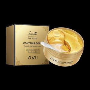 May include: Gold eye mask in a jar with a gold lid and a gold spatula. The jar has the text "ZOZUI GOLDEN EYE MASK Smooth And Moisturizing" on the front. The box has the text "Smooth EYE MASK CONTAINS GOLD Smooth And Moisturizing SMOOTH AND DELICATE Beautiful Your Skin ZOZU" on the front.