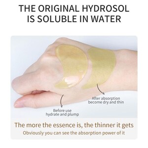 May include: Close-up image of two under-eye patches on a person's hand. The patches are translucent and have a light green color. The text on the image reads: "The more you apply, the thinner your skin absorbs the essence. The original hydrosol is soluble in water."