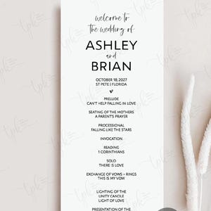 May include: A white wedding program card featuring black text that reads: Choose from over 15 fonts, welcome to the wedding of ASHLEY and BRIAN, OCTOBER 18, 2027, ST PETE | FLORIDA, and a detailed order of ceremony including songs and readings.